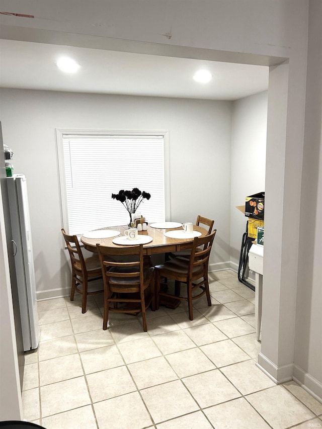 2109 E Gum St, Evansville, IN 47714 - dining space featuring light tile patterned flooring and recessed lighting