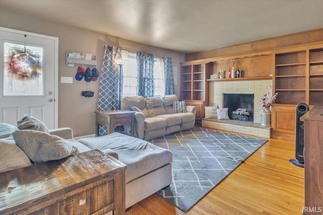 2607 Meadow Lark Ln, Evansville, IN 47720 - living area with wood finished floors and a fireplace