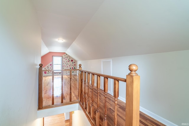 208 Chestnut St, Avilla, IN 46710 - stairs with wood finished floors and vaulted ceiling