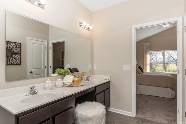 2057 Abbey Ln, Columbus, IN 47201 - ensuite bathroom featuring double vanity and wood finish floors