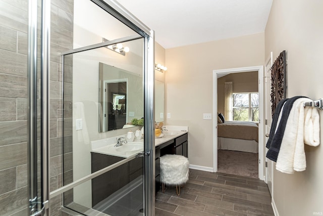 2057 Abbey Ln, Columbus, IN 47201 - bathroom featuring ensuite bath, double vanity, wood finish floors, and tiled shower