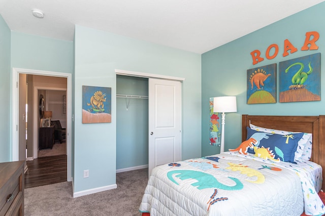 2057 Abbey Ln, Columbus, IN 47201 - carpeted bedroom featuring a closet and baseboards