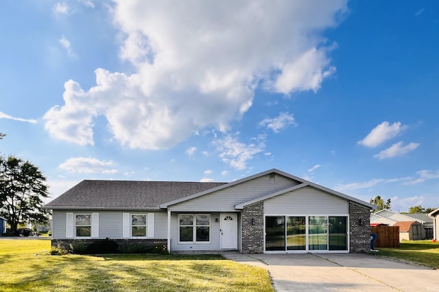 3563 County Road 40a, Auburn, IN 46706 - view of front facade featuring brick siding and roof with shingles