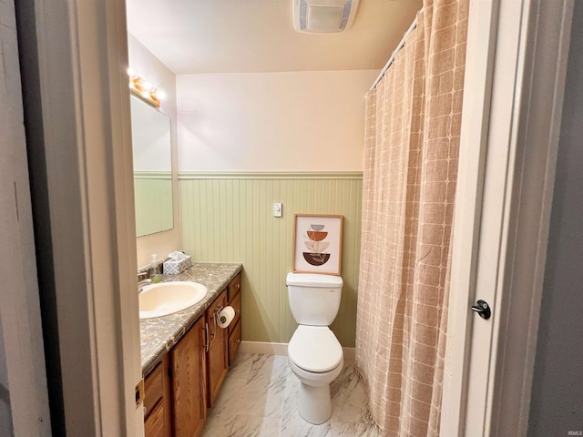 3563 County Road 40a, Auburn, IN 46706 - bathroom with wainscoting, marble finish floors, and vanity