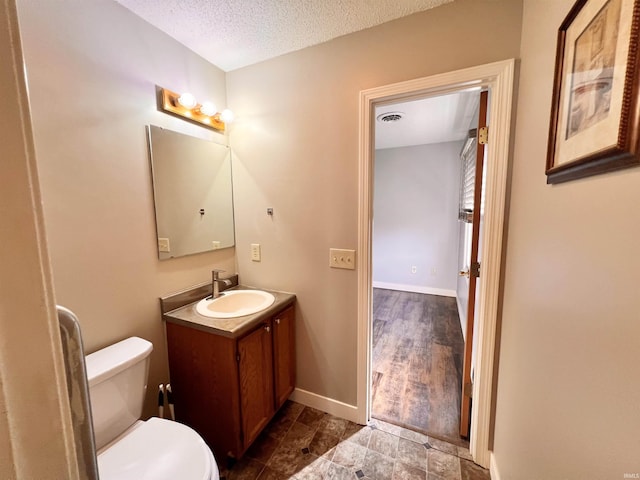 3563 County Road 40a, Auburn, IN 46706 - half bath featuring vanity and a textured ceiling
