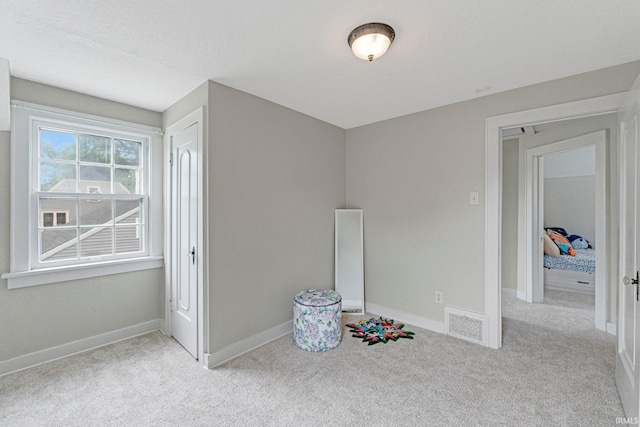 4643 Calumet Ave, Fort Wayne, IN 46806 - unfurnished bedroom featuring carpet and baseboards