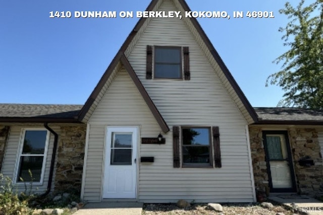 1410 Dunham On Berkley, Kokomo, IN 46901 - view of front of house featuring stone siding and roof with shingles