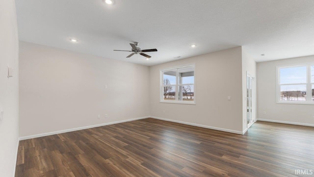 5103 Buffay Ct, New Haven, IN 46774 - spare room with dark wood-style floors, a ceiling fan, and recessed lighting