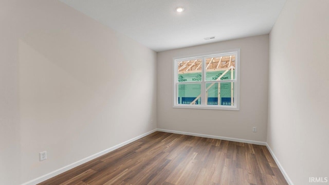 5103 Buffay Ct, New Haven, IN 46774 - unfurnished room featuring dark wood-style floors and baseboards