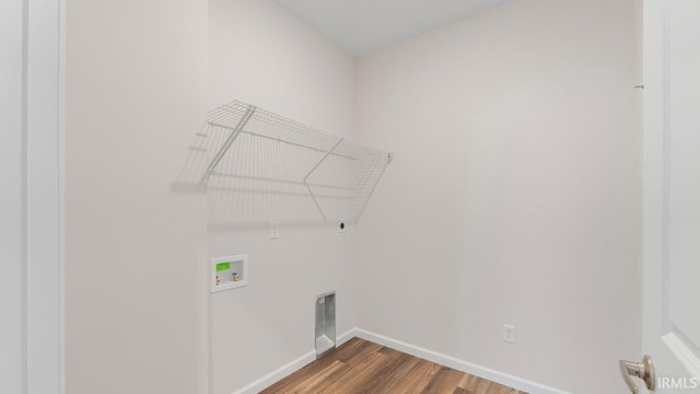 5103 Buffay Ct, New Haven, IN 46774 - laundry area featuring washer hookup, wood finished floors, and electric dryer hookup