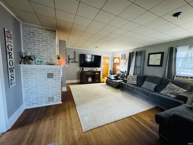 1533 E Paw Paw Pike, Peru, IN 46970 - living area with baseboard heating and wood finished floors