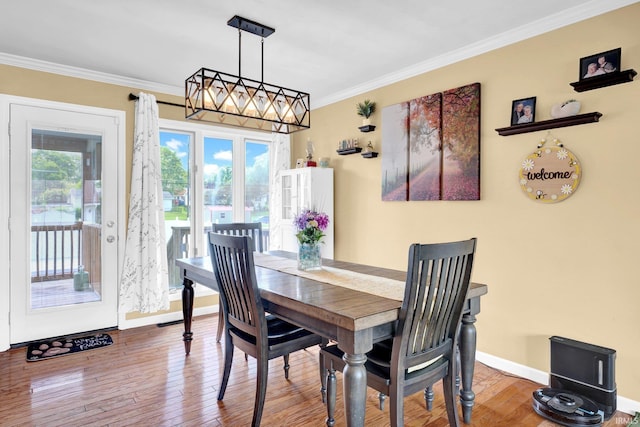 1803 Linwood Dr, Bedford, IN 47421 - dining room featuring ornamental molding and wood finished floors