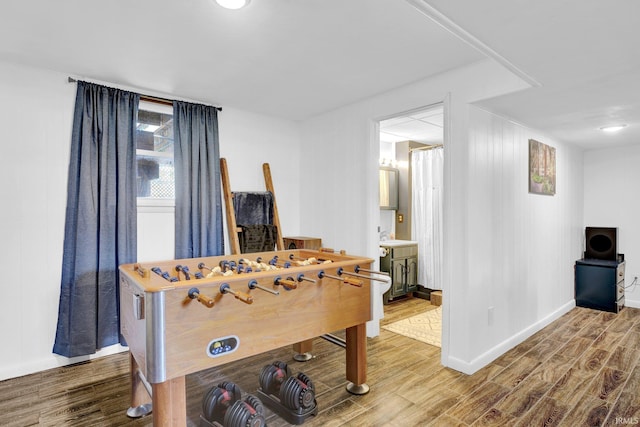 1803 Linwood Dr, Bedford, IN 47421 - playroom featuring wood finished floors and baseboards