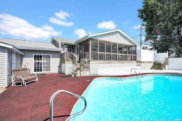 1803 Linwood Dr, Bedford, IN 47421 - swimming pool featuring stairway, a sunroom, and a patio area
