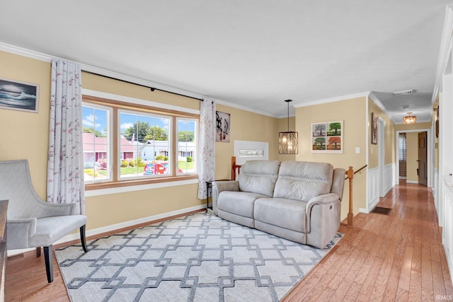 1803 Linwood Dr, Bedford, IN 47421 - living room featuring light wood-type flooring and ornamental molding