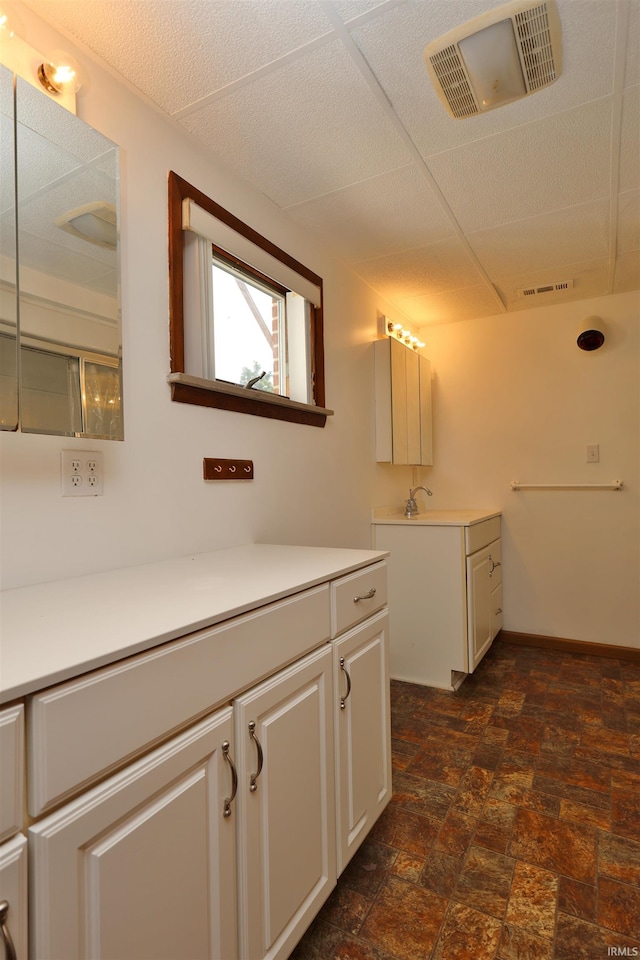 1765 E Old Kokomo Rd, Marion, IN 46953 - bathroom with two vanities and stone finish floors