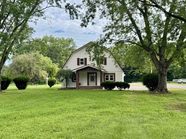 1765 E Old Kokomo Rd, Marion, IN 46953 - dutch colonial with a gambrel roof, a front lawn, and covered porch