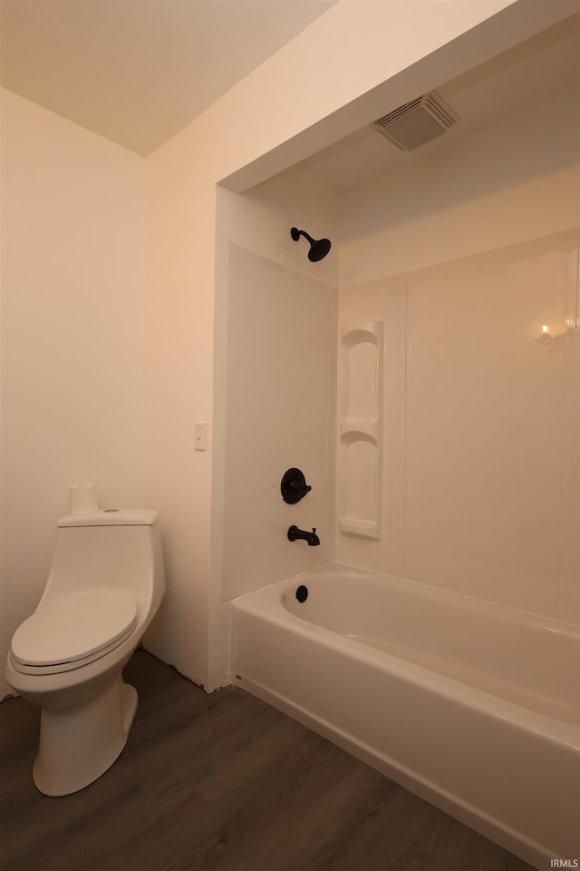 1765 E Old Kokomo Rd, Marion, IN 46953 - bathroom with wood finished floors and bathtub / shower combination