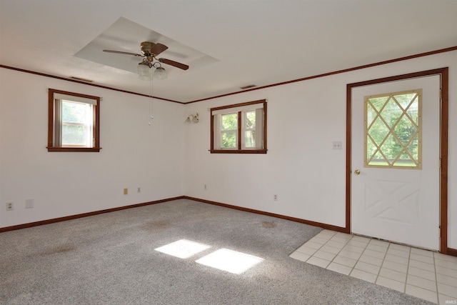 1765 E Old Kokomo Rd, Marion, IN 46953 - spare room with light carpet, a ceiling fan, and crown molding