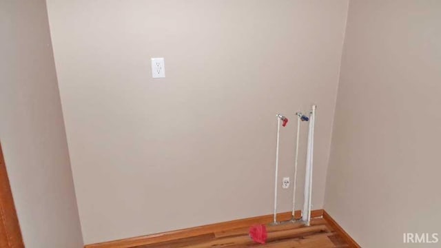 716 Kimmell Rd, Vincennes, IN 47591 - washroom featuring wood finished floors and baseboards