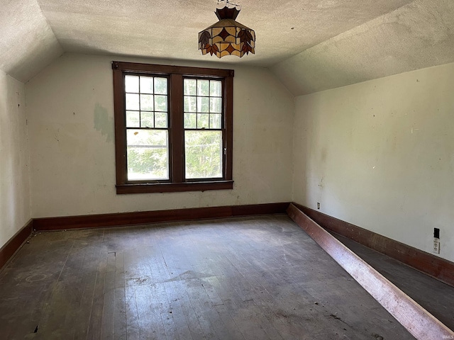 2812 Oliver Rd, Mount Vernon, IN 47620 - bonus room featuring vaulted ceiling, a textured ceiling, and wood-type flooring