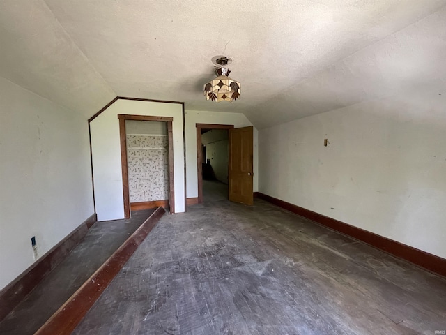 2812 Oliver Rd, Mount Vernon, IN 47620 - bonus room featuring lofted ceiling and a textured ceiling