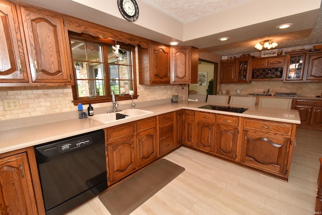 805 S James Ave, Fowler, IN 47944 - kitchen with black appliances, tasteful backsplash, brown cabinets, glass insert cabinets, and recessed lighting