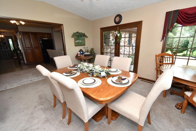 805 S James Ave, Fowler, IN 47944 - dining space with light carpet, a chandelier, and lofted ceiling