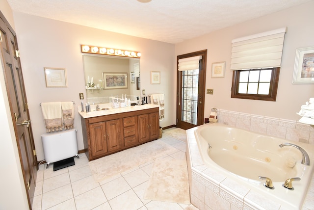 805 S James Ave, Fowler, IN 47944 - bathroom with double vanity, a jetted tub, and tile patterned flooring