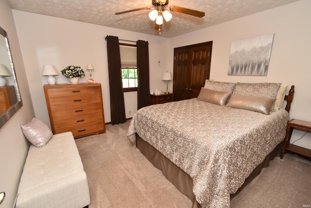 805 S James Ave, Fowler, IN 47944 - bedroom with light carpet, a textured ceiling, and ceiling fan