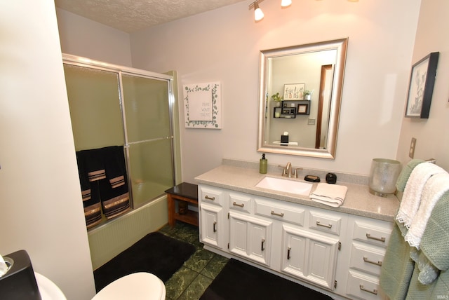 805 S James Ave, Fowler, IN 47944 - full bath with vanity, bath / shower combo with glass door, and a textured ceiling