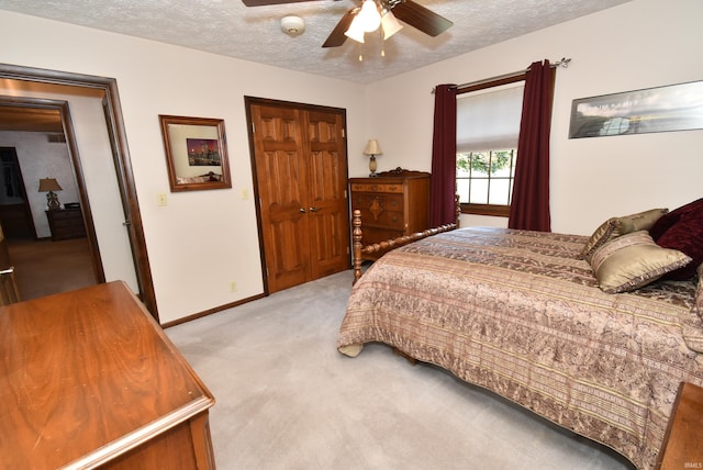 805 S James Ave, Fowler, IN 47944 - bedroom featuring light carpet, a textured ceiling, ceiling fan, and a closet