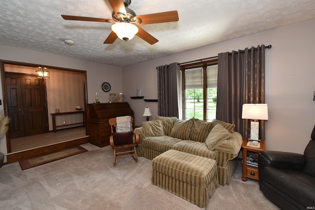 805 S James Ave, Fowler, IN 47944 - living area with light colored carpet, a textured ceiling, and a ceiling fan