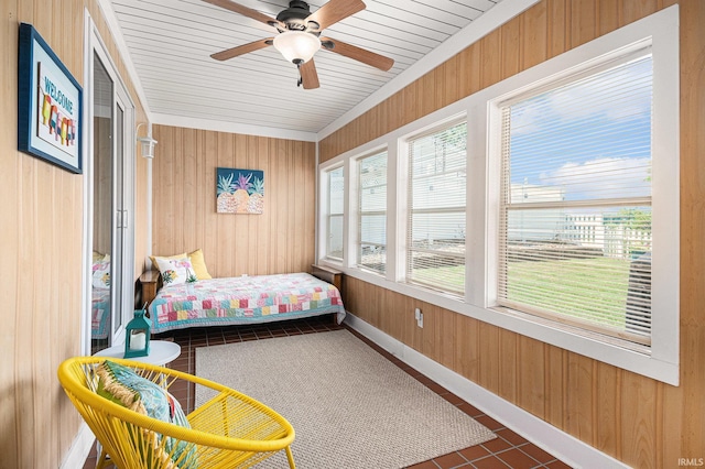 11685 W 710 N, Middlebury, IN 46540 - tiled bedroom featuring wooden walls and a ceiling fan