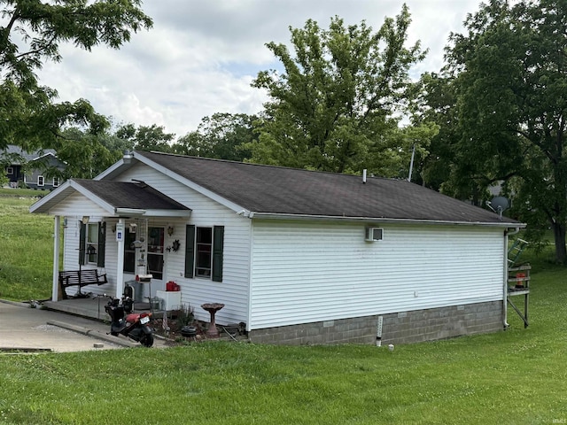 2415-2417 L St, Bedford, IN 47421 - view of side of property with a lawn, covered porch, crawl space, and roof with shingles