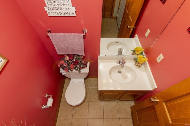2233 Pine Creek Ct, South Bend, IN 46628 - bathroom with tile patterned flooring and vanity