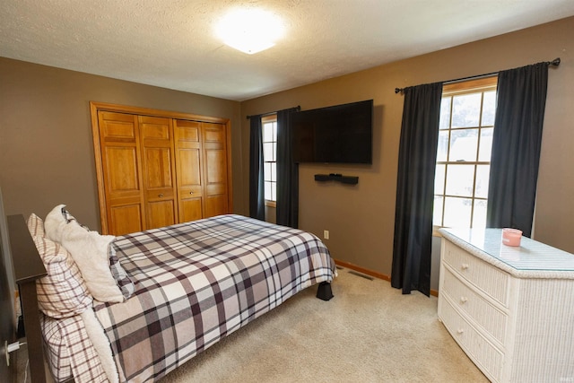 2233 Pine Creek Ct, South Bend, IN 46628 - bedroom featuring light colored carpet and a closet