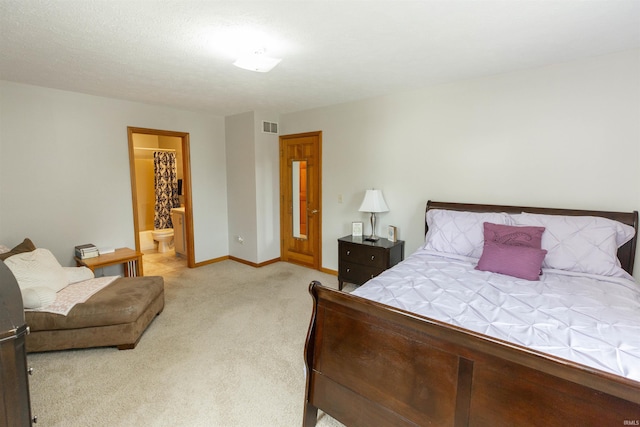2233 Pine Creek Ct, South Bend, IN 46628 - bedroom with light carpet and connected bathroom