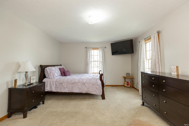 2233 Pine Creek Ct, South Bend, IN 46628 - bedroom featuring light colored carpet and baseboards