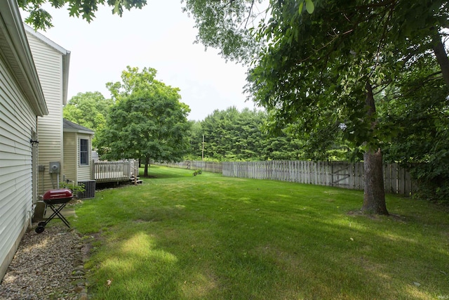 2233 Pine Creek Ct, South Bend, IN 46628 - fenced backyard featuring a wooden deck