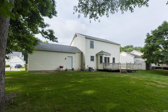 2233 Pine Creek Ct, South Bend, IN 46628 - back of house with a deck, a yard, and a shed