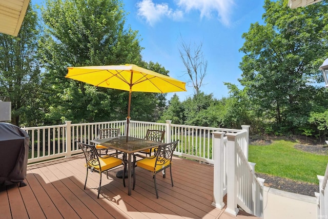4221 Cordell Cv, Fort Wayne, IN 46845 - wooden terrace with outdoor dining area, view of scattered trees, and a yard