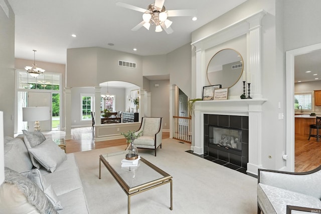 118 Royal Crest Dr, Fort Wayne, IN 46814 - living area with ceiling fan, a chandelier, a tile fireplace, plenty of natural light, and recessed lighting