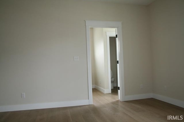 1001 E Clinton St, Frankfort, IN 46041 - unfurnished room with wood finished floors and baseboards