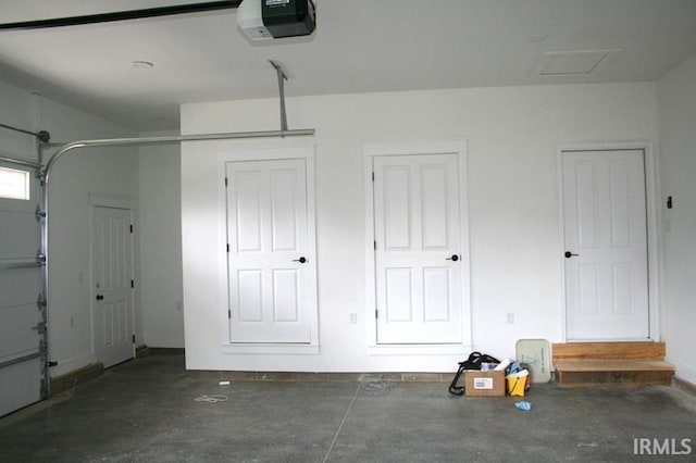 1001 E Clinton St, Frankfort, IN 46041 - garage featuring a garage door opener