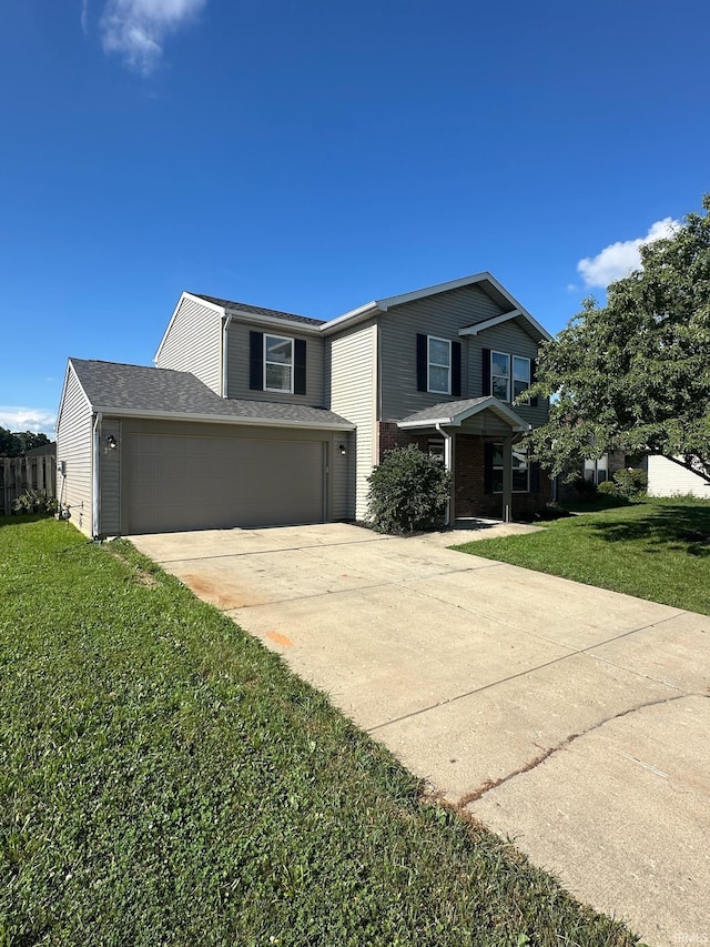 914 Braxton Dr N, Lafayette, IN 47909 - traditional-style house featuring concrete driveway, a front lawn, an attached garage, and covered porch