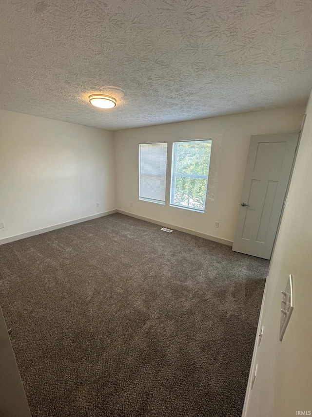 914 Braxton Dr N, Lafayette, IN 47909 - empty room featuring carpet flooring and a textured ceiling