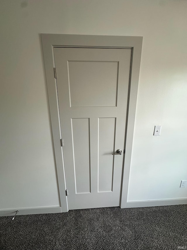 914 Braxton Dr N, Lafayette, IN 47909 - detailed view of baseboards and speckled floor