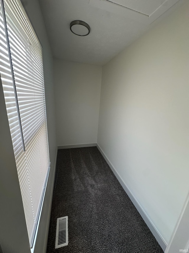 914 Braxton Dr N, Lafayette, IN 47909 - empty room with dark carpet and baseboards