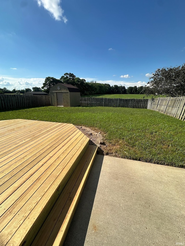 914 Braxton Dr N, Lafayette, IN 47909 - wooden deck with a storage unit and a fenced backyard